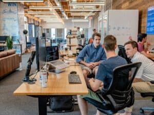 Team of professionals collaborating in a modern office setting.